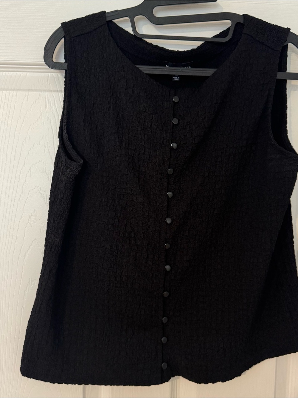 Sleeveless Black Textured Button-Front Blouse